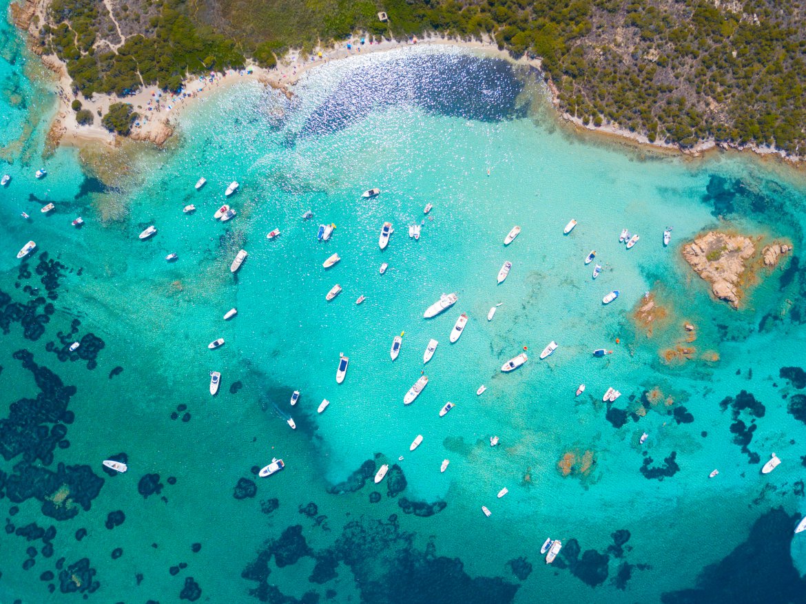 Top view of boats in Sardinia. swimming-sea-water