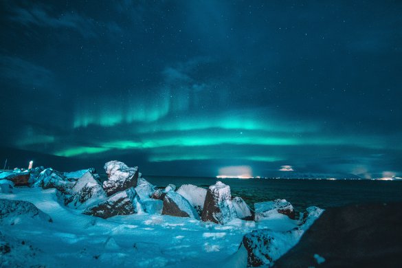 Northern lights and snowy landscape. Iceland Campervan Trip Tips