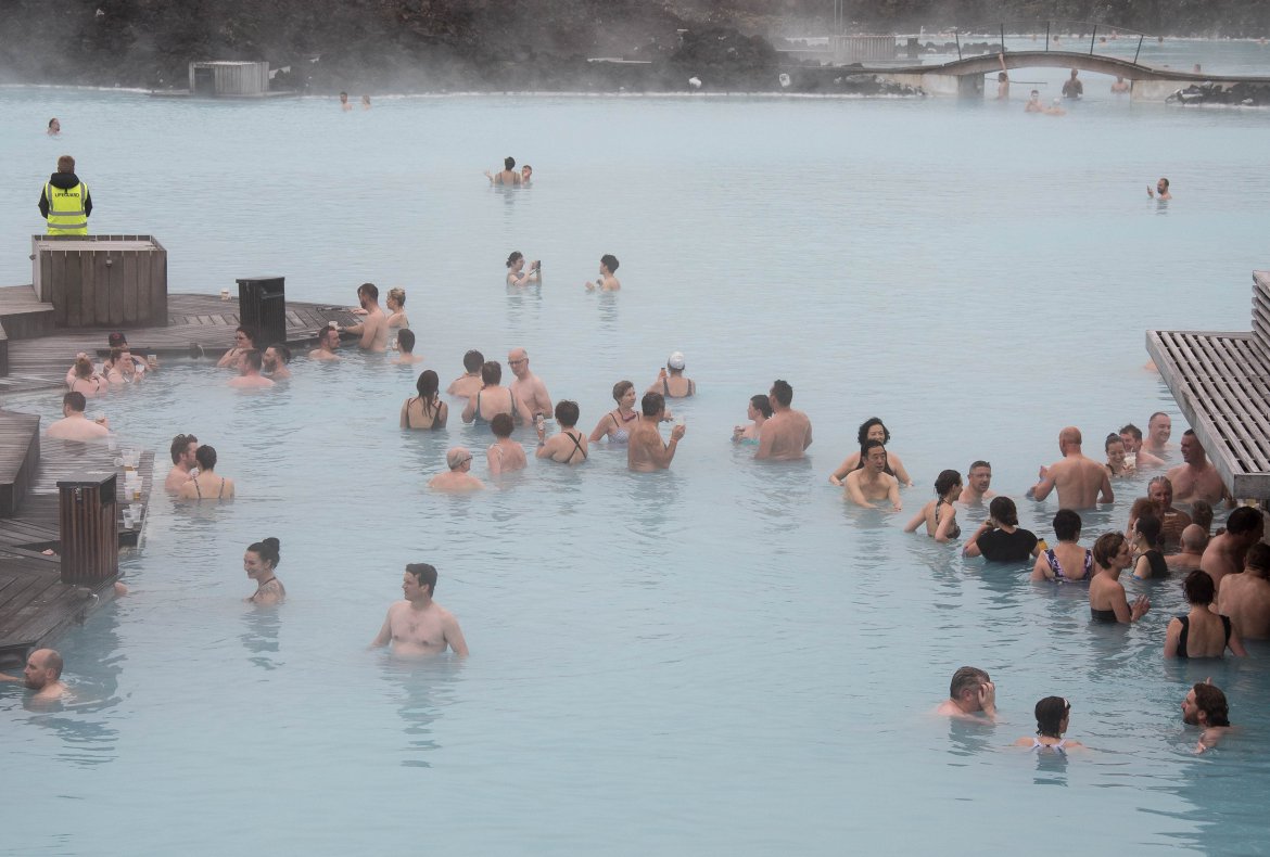 People in blue lagoon Iceland. Iceland Campervan Trip Tips